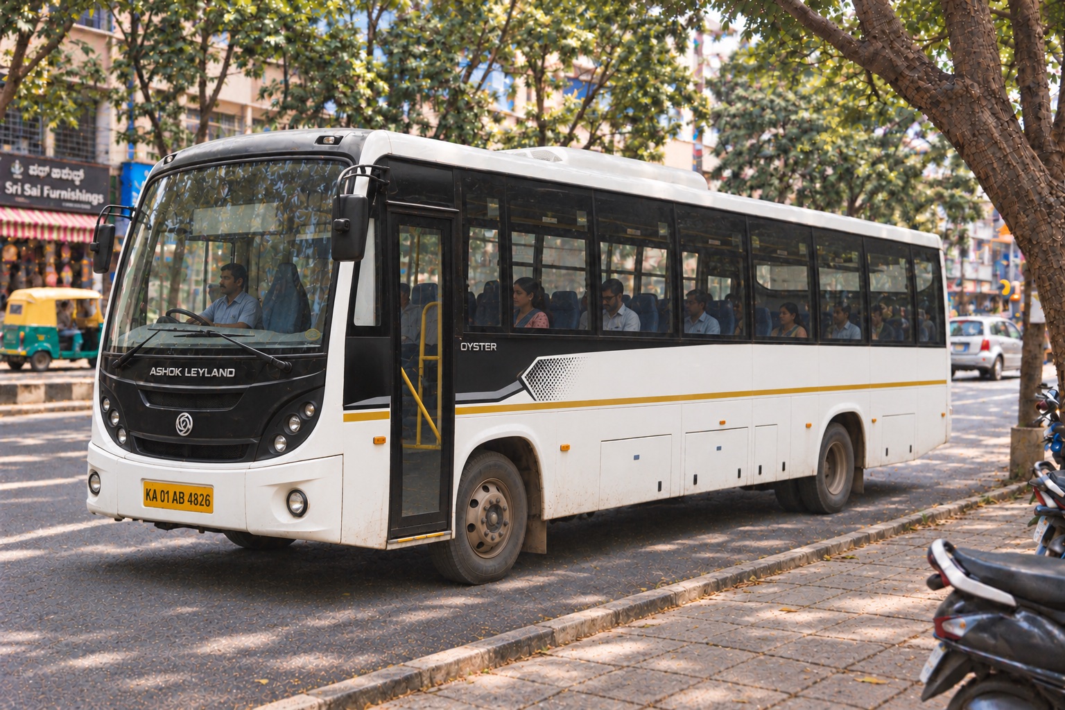 An occupied employee shuttle bus with passengers and driver in Bangalore, India